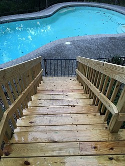 Stairs From Lower Level Down To Pool