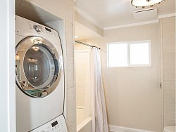 Bathroom with New Washer & Dryer Location Instead of Dark Unfinished Basement