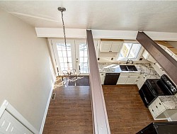 Removed First Floor Ceiling to Open Up Loft to the Kitchen & Dining Area