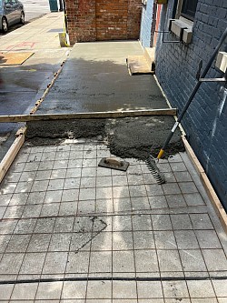 We started the concrete pour today for the elevated pad. The brick pavers will be mortared in place.