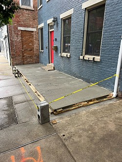 We weren’t trying to make the elevated pad beautiful, but  rather flat and smooth enough to attach the brick pavers to with mortar.