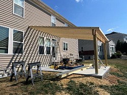 All new concrete patio and the structural framing is complete.