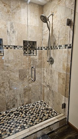 All of the tile coordinates well with each other. The homeowners did an excellent job picking out there materials!