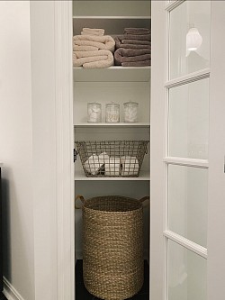 Corner linen closet.