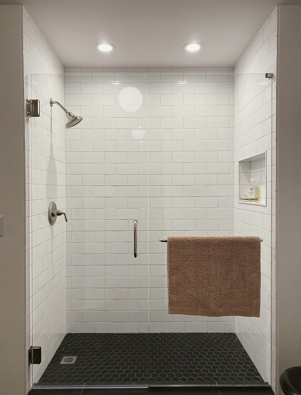 Large walk-in shower with everything you need.