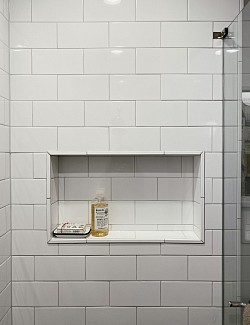 Shower niche with more than enough space.