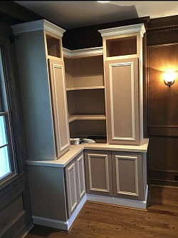 After we built the custom cabinetry and before we painted and stained it.