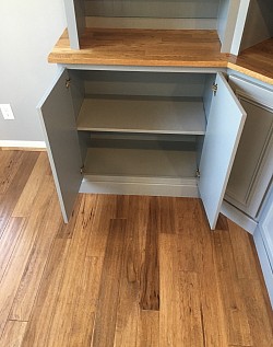 The insides of the cabinets and the shelving was fully painted.