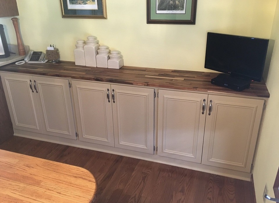 We installed a butcher block countertop that was tongue oiled to give it a deep rich patina and to protect it from staining.