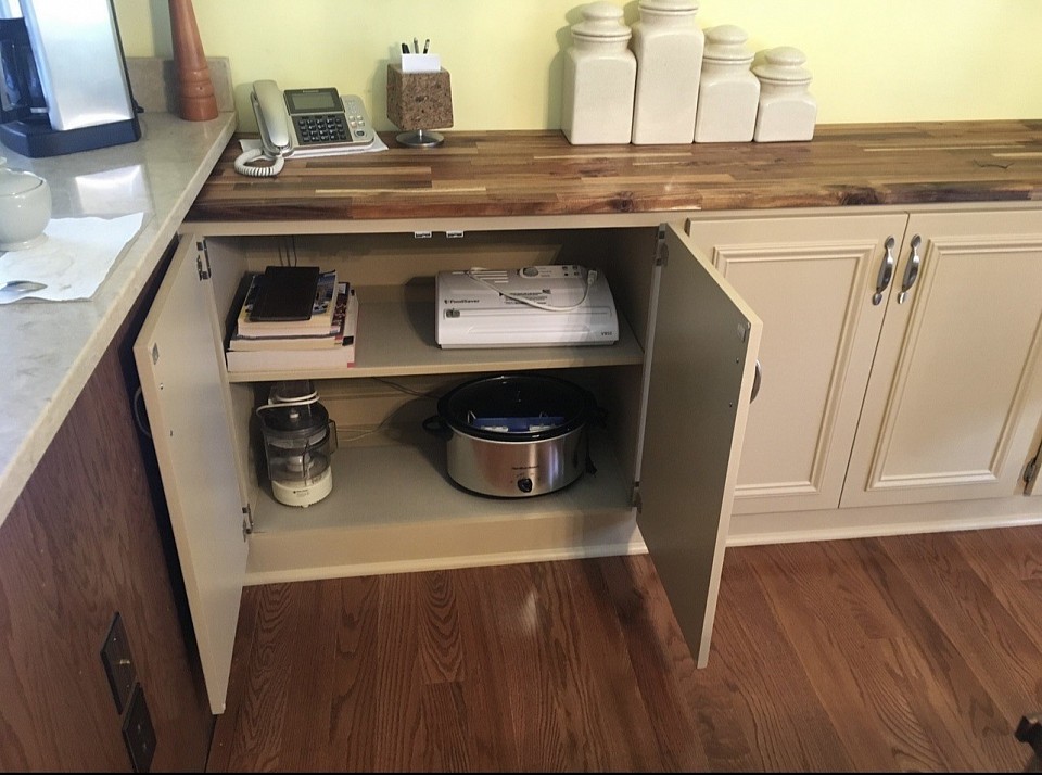 The insides of all the cabinets were fully painted to match the outside.